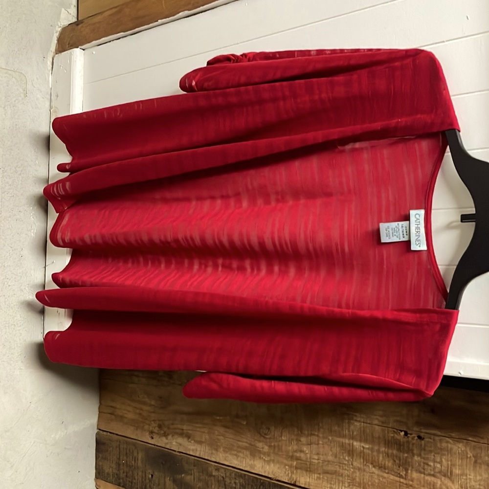 Women’s red shrug brand new with tags size ox 14-16wp very pretty not solid red